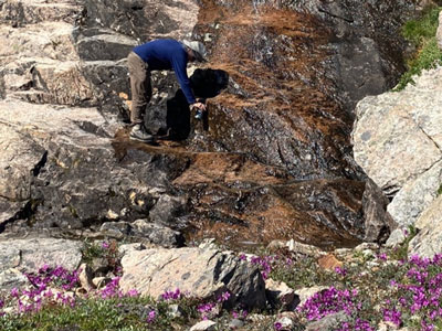 Drinking water on trail