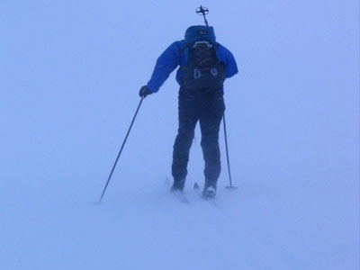 Ski touring in whiteout conditions